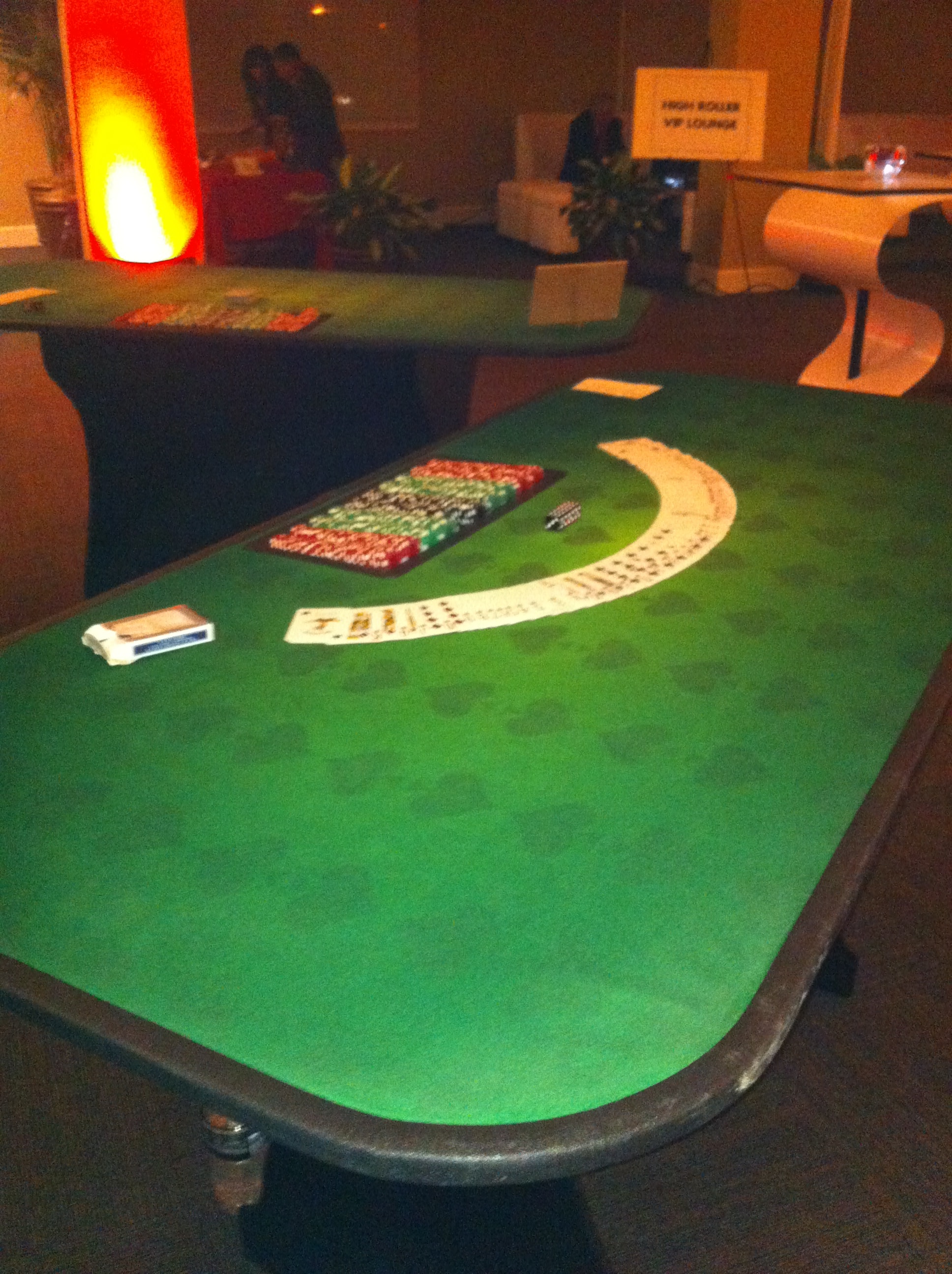 Poker table setup at evening event